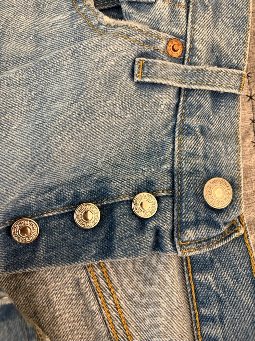 Levi's Light Blue Distressed Straight Leg Jeans